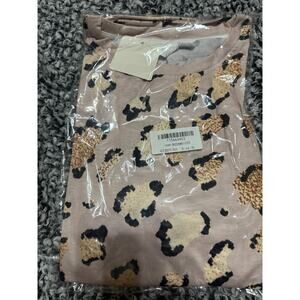 Women's Size XL shirt. NWT. Pixi Lady. Leopard Print!